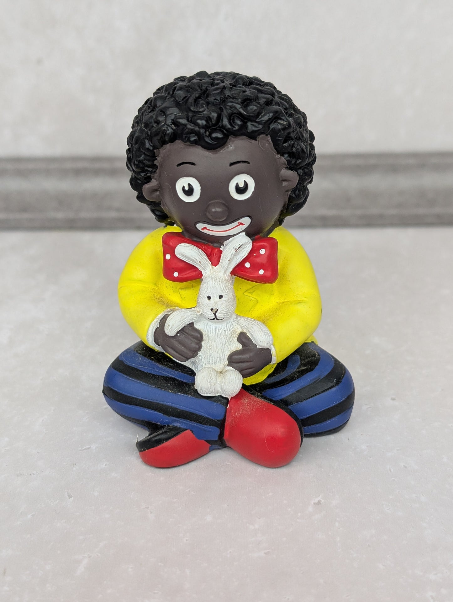 Golly Holding Rabbit