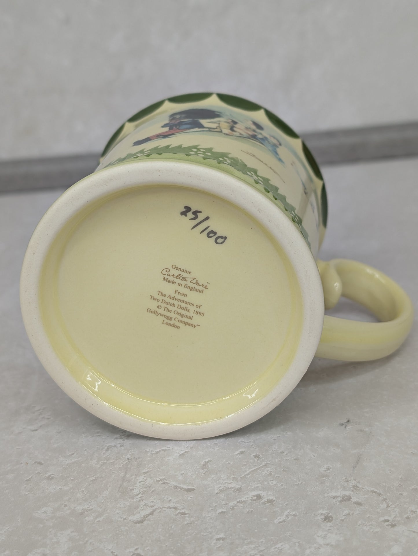 Golly Sledging in Snow with Dutch Dolls Mug by Carltonware