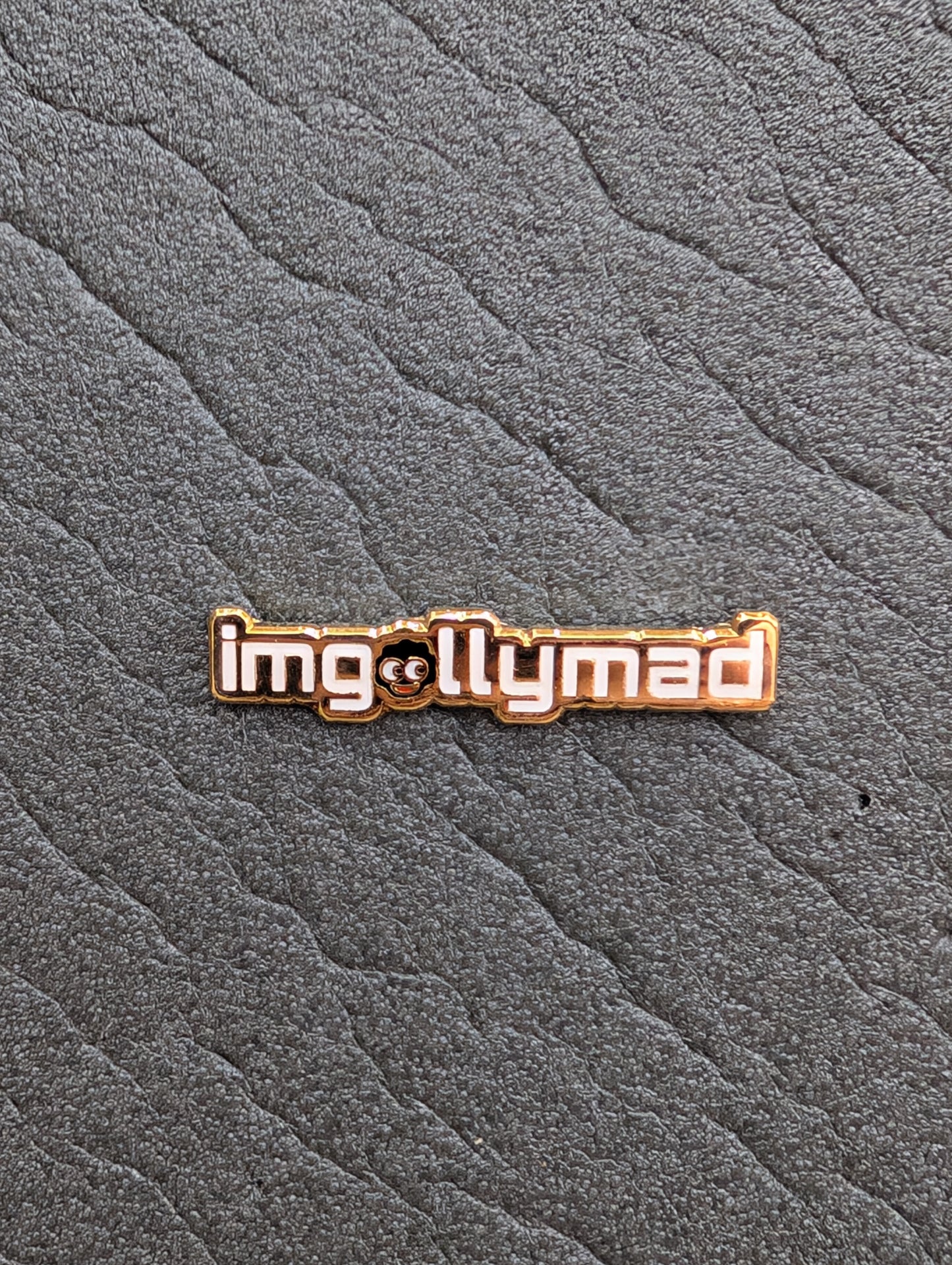 imgollymad White Logo Badge