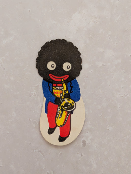 1950s Robertsons Saxophonist Token