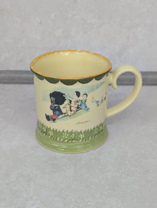 Golly Sledging in Snow with Dutch Dolls Mug by Carltonware