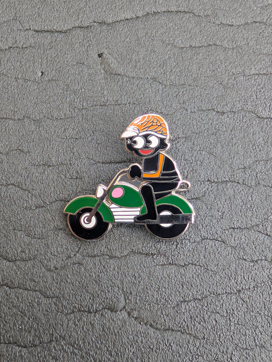 Golly on Green Motorbike