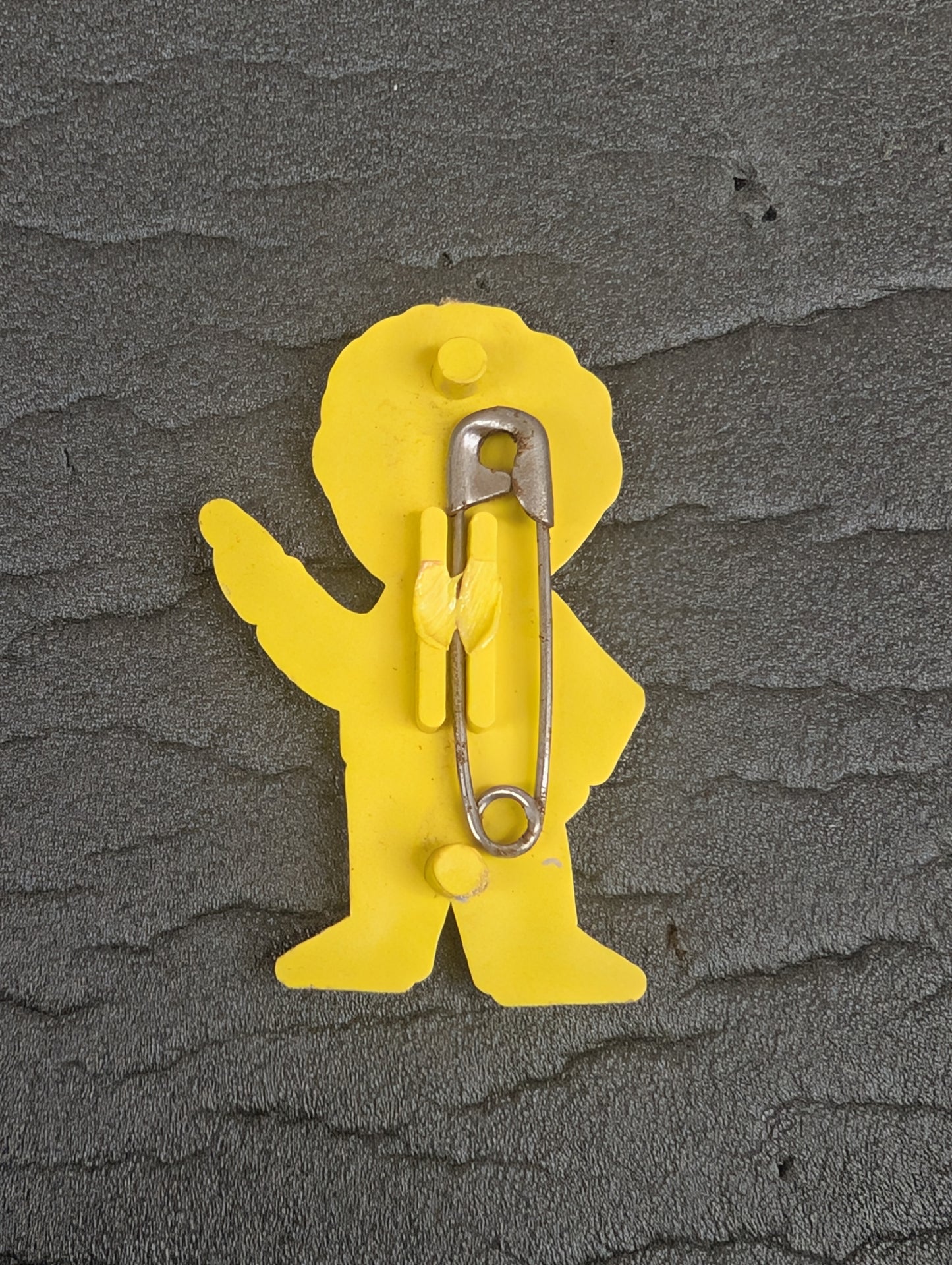 PG Plastic Golly Black on Yellow 1970s