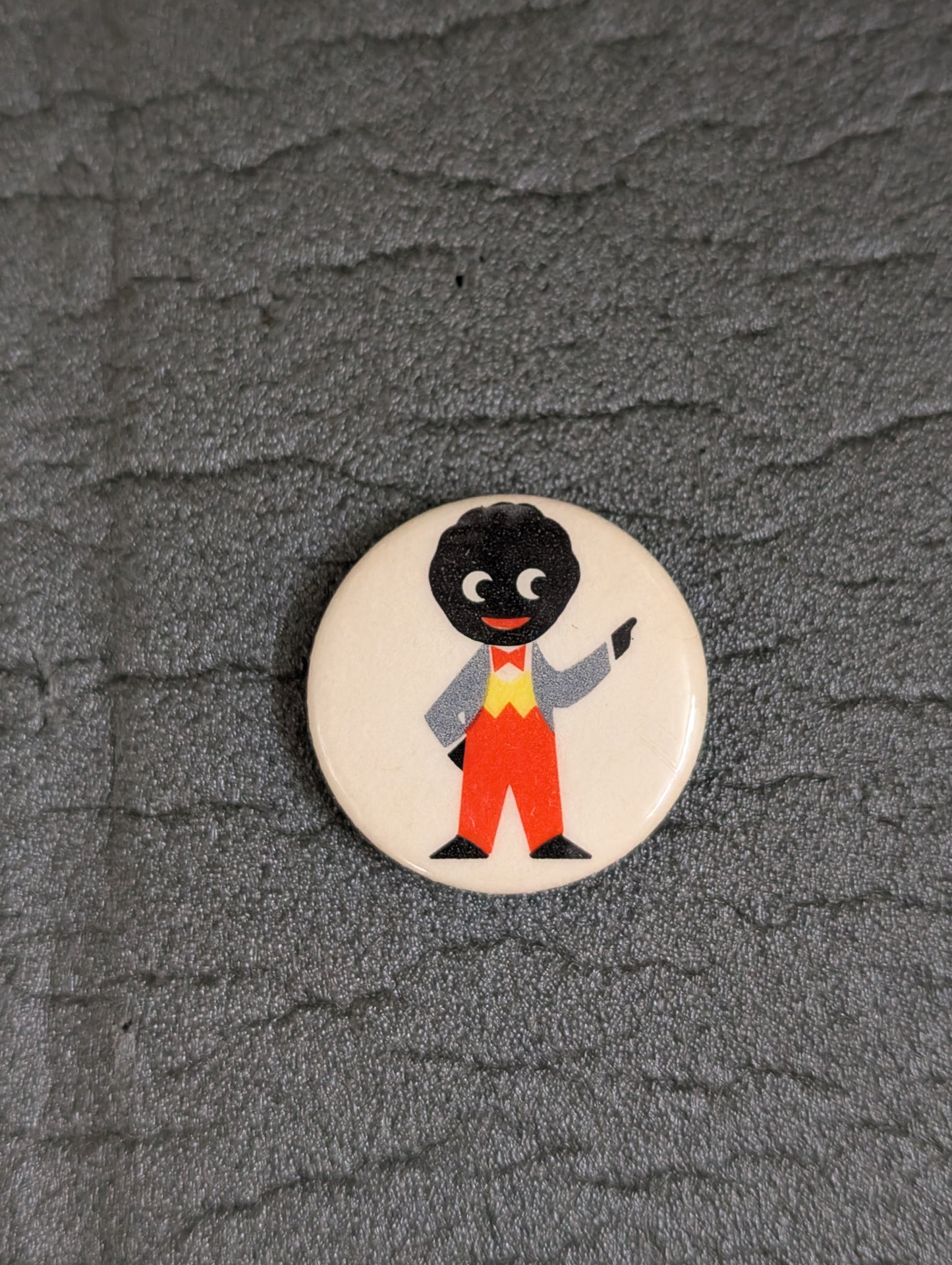 Rare One Arm Raised Button Badge