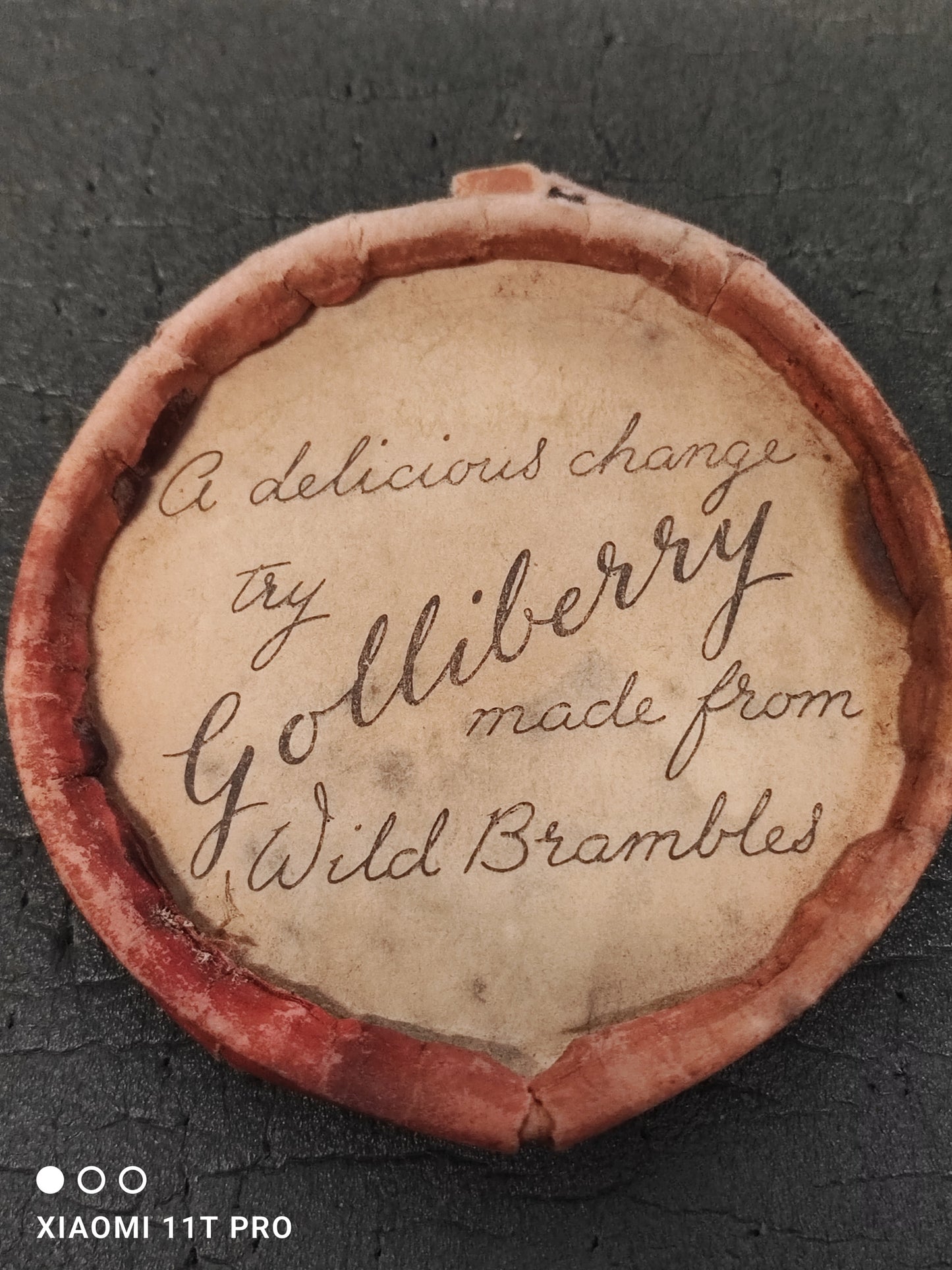 Red 1lb Paper Jar Lid Golliberry Advert