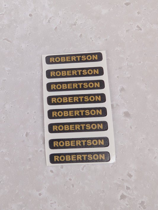 Set of 8 Replacement Robertson Stickers for Plaster Figures.