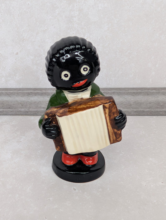 Small Black Base Accordionist by Carltonware