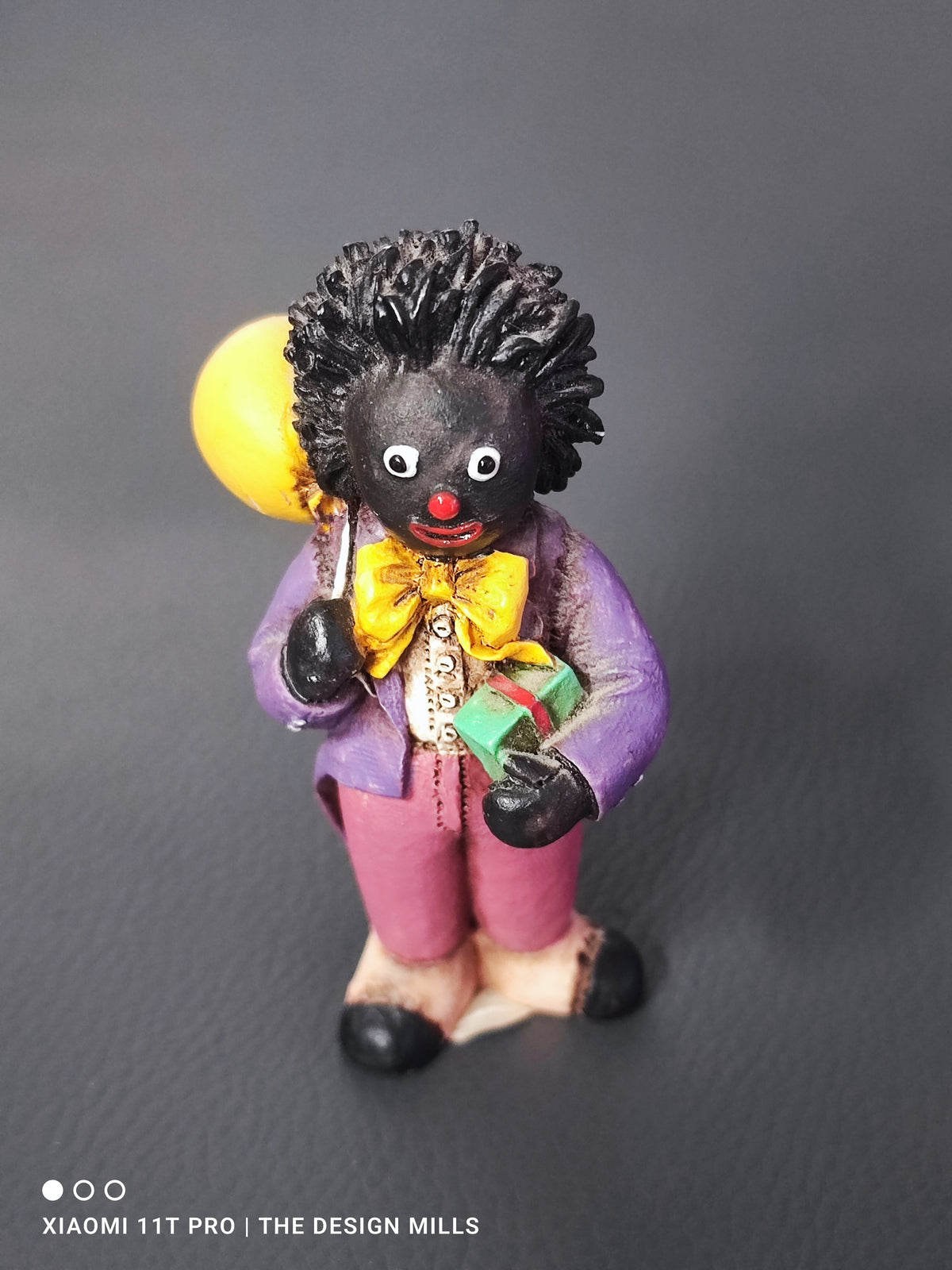 Shudehill Figure Holding Gift and Balloon