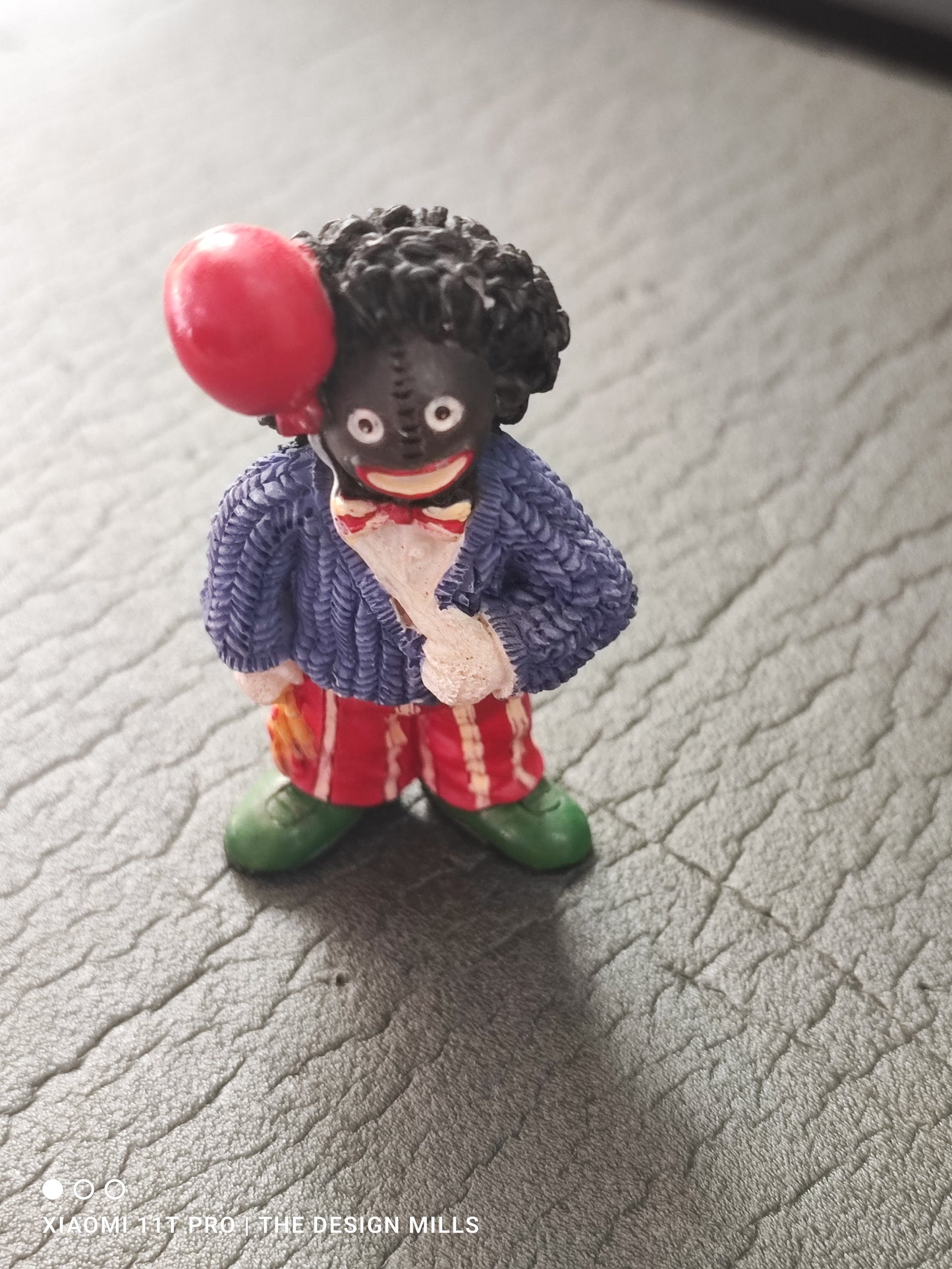 Small Golly Figure Holding Balloon